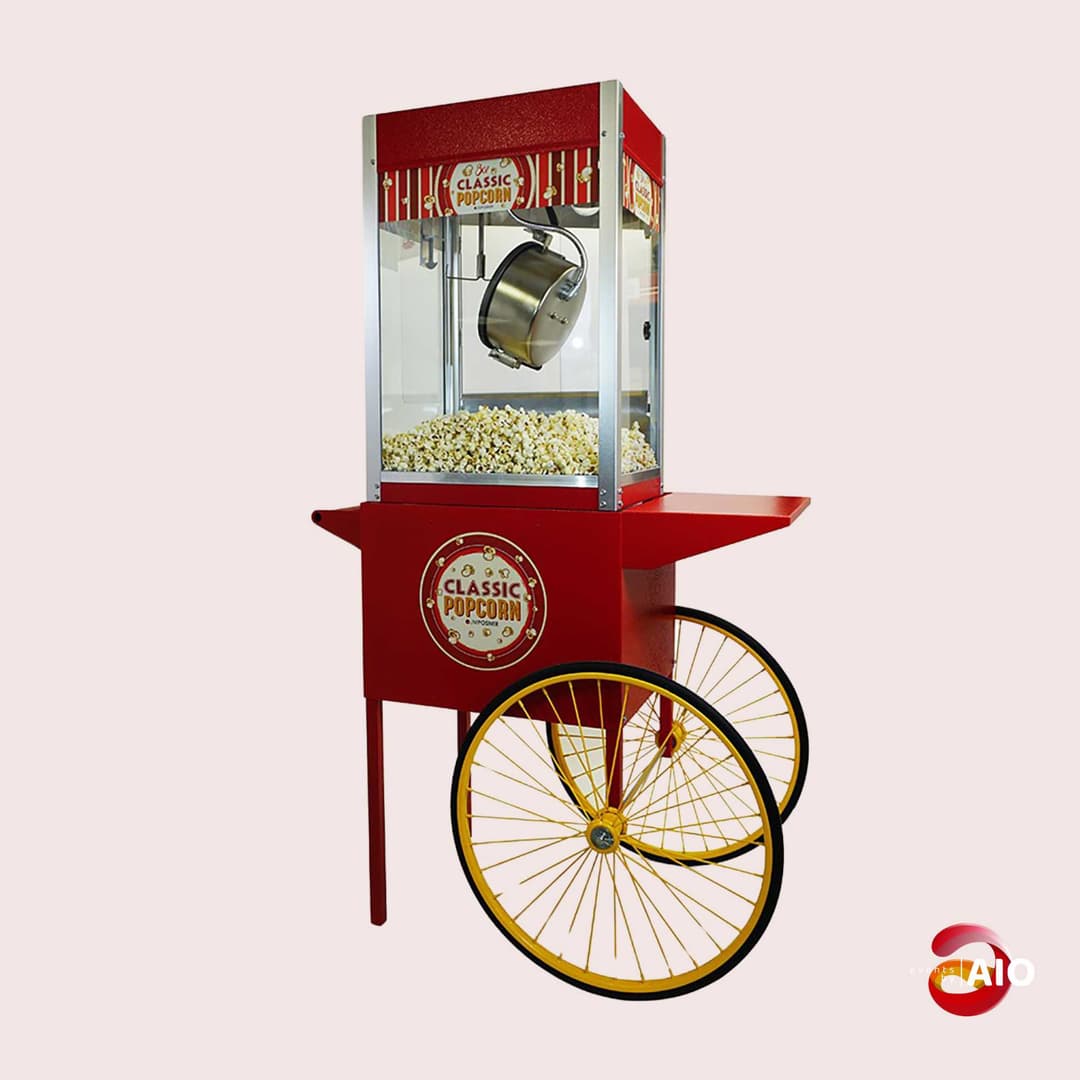 red popcorn cart with popcorn